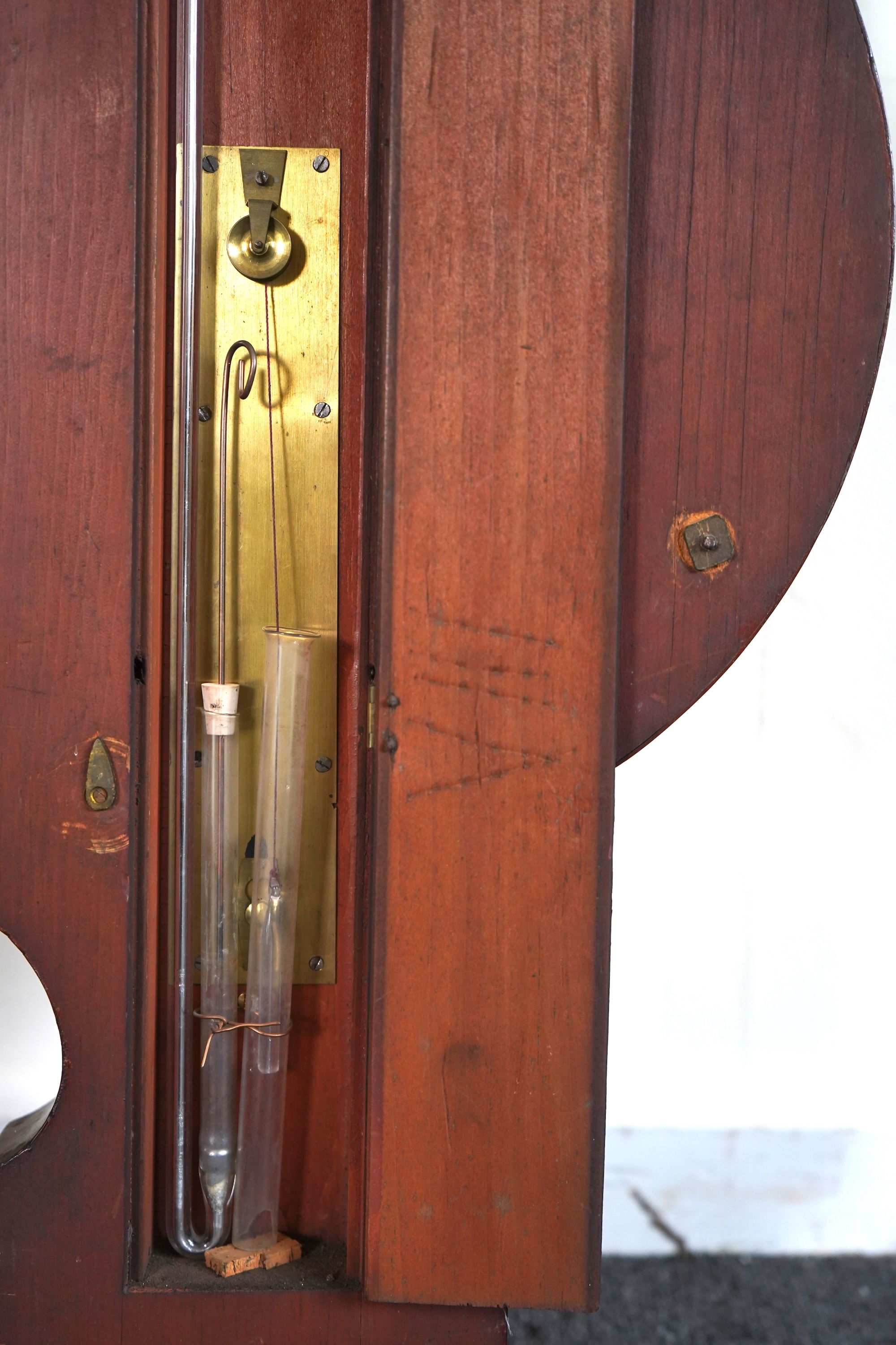 A large mid 19th century tulipwood banded mahogany wheel barometer, by C. Rimondi, Halifax
